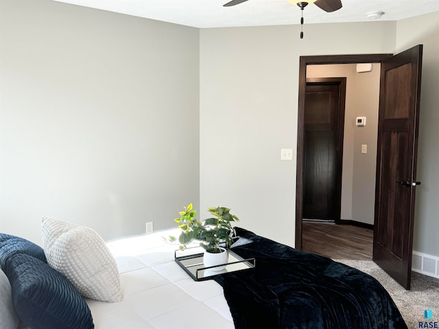 bedroom with ceiling fan and light wood-type flooring