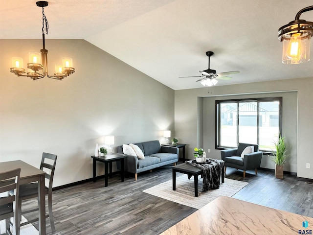 living room featuring ceiling fan with notable chandelier, dark hardwood / wood-style floors, and lofted ceiling