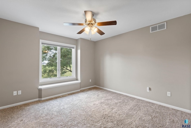 unfurnished room featuring carpet flooring and ceiling fan