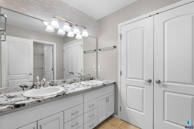 bathroom with vanity and tile patterned floors