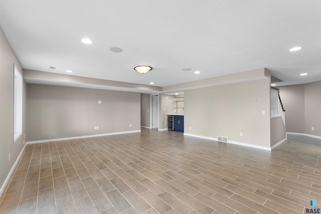 unfurnished living room with light wood-type flooring