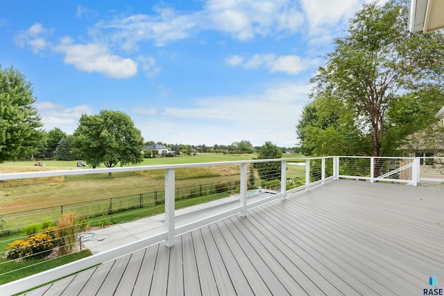 deck featuring a yard