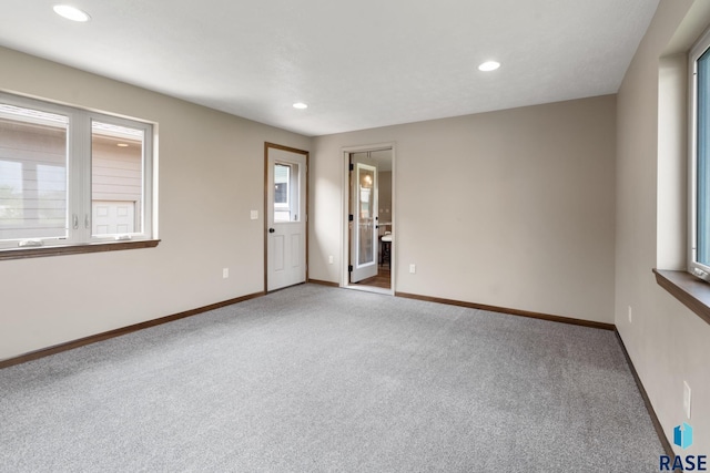 unfurnished room with carpet