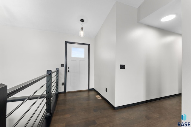 entrance foyer featuring dark hardwood / wood-style floors