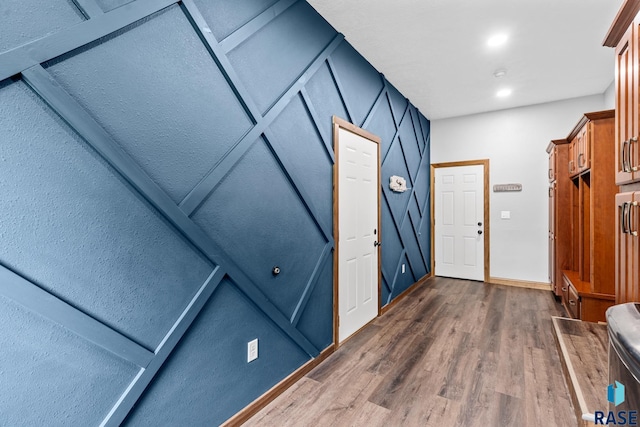 entryway with dark hardwood / wood-style floors