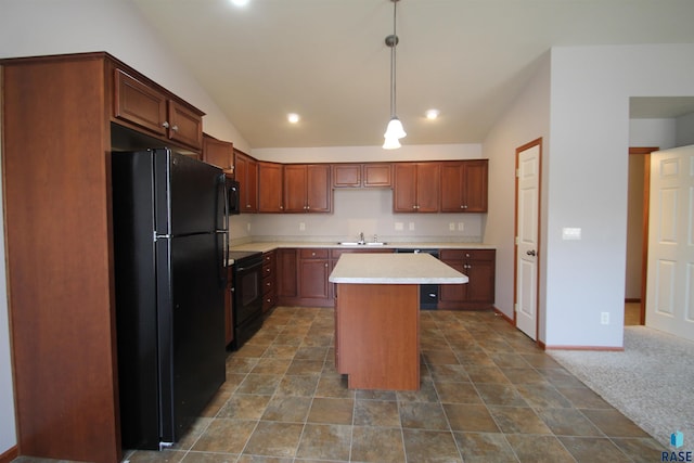 kitchen featuring lofted ceiling, a kitchen island, hanging light fixtures, black appliances, and sink