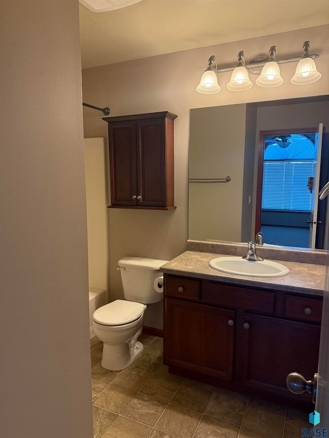 full bathroom featuring vanity, toilet, bathtub / shower combination, and tile patterned floors