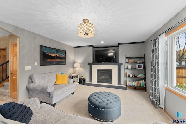 carpeted living room with a textured ceiling