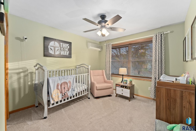 bedroom with light carpet, a wall unit AC, a crib, and ceiling fan