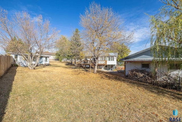 view of yard featuring a deck