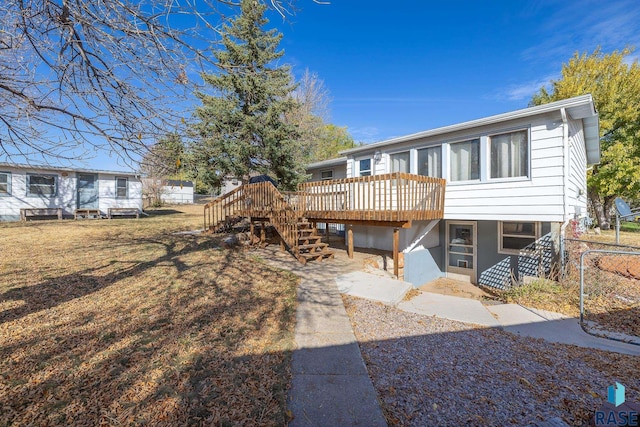 view of front of property with a deck