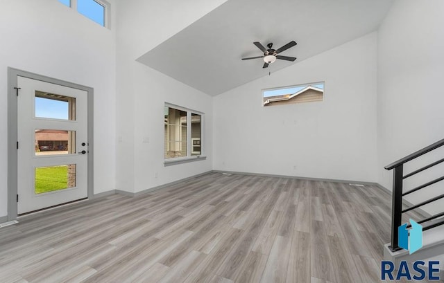 interior space featuring ceiling fan