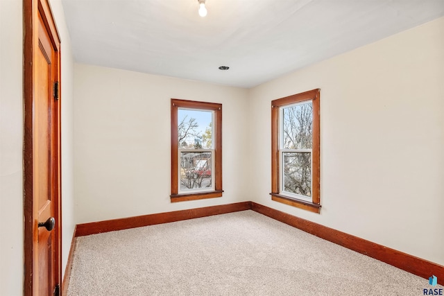 unfurnished room featuring carpet floors