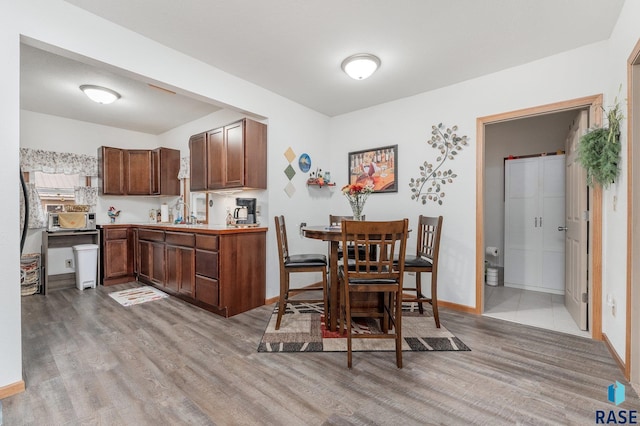 kitchen with light hardwood / wood-style floors