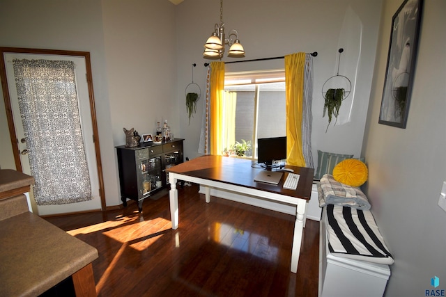 interior space featuring hardwood / wood-style flooring and a chandelier