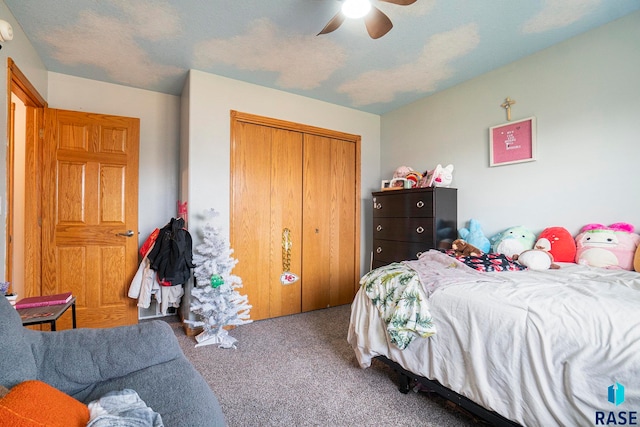 bedroom featuring carpet, a closet, and ceiling fan