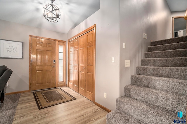 foyer entrance featuring light hardwood / wood-style floors