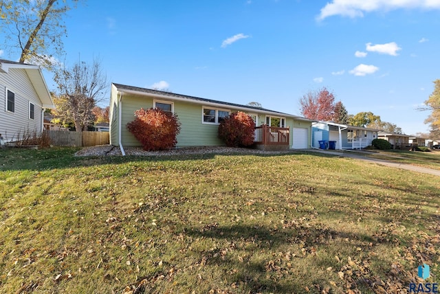 ranch-style home with a front yard