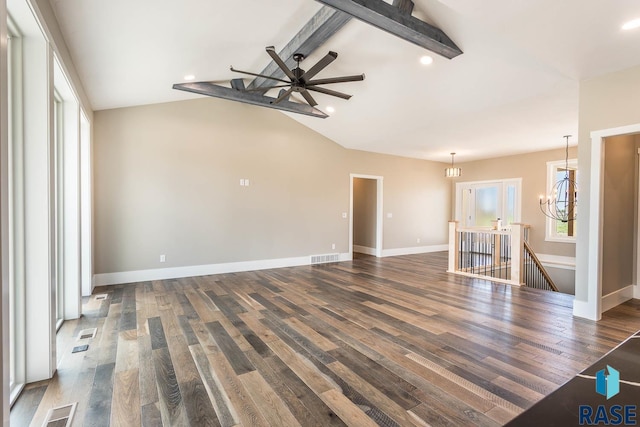 unfurnished living room with vaulted ceiling with beams, dark hardwood / wood-style flooring, and ceiling fan with notable chandelier