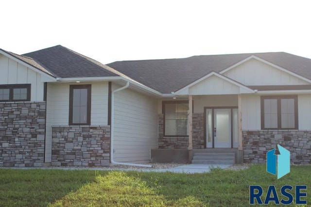 ranch-style house with a front yard