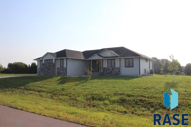 ranch-style home with a front yard