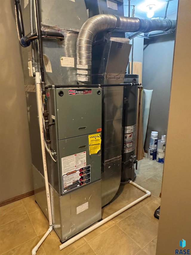 utility room with gas water heater and heating unit