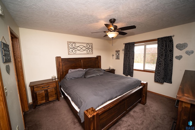 carpeted bedroom featuring ceiling fan and a textured ceiling