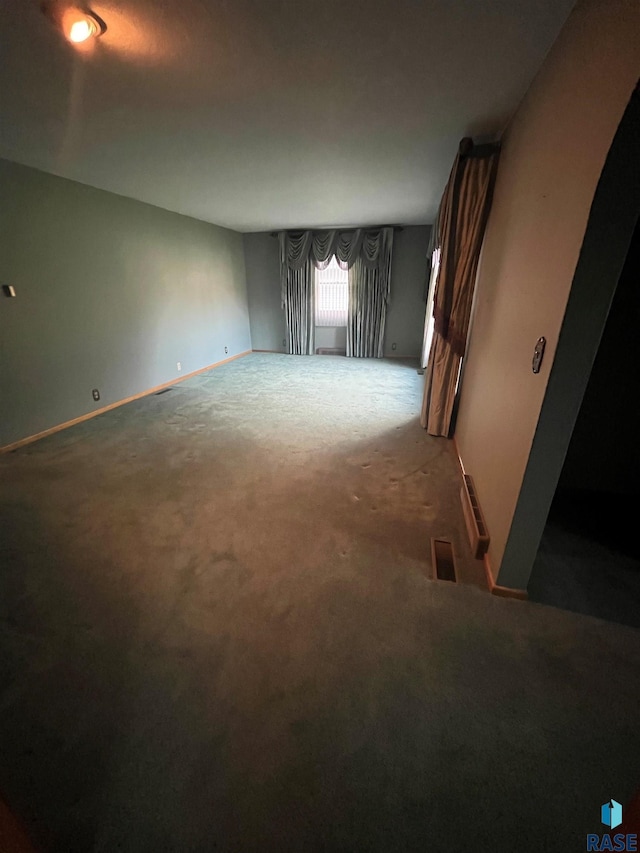 spare room with carpet