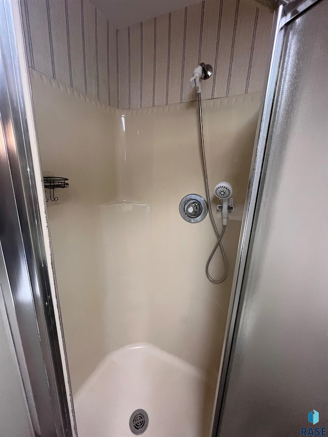 bathroom featuring walk in shower