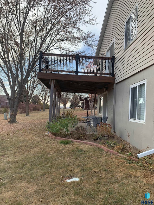 view of yard featuring a deck