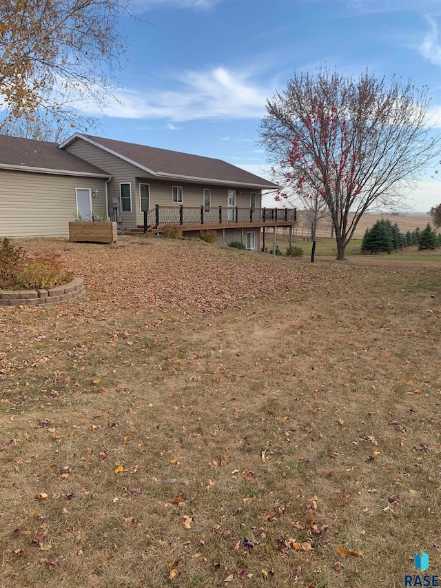 view of yard featuring a deck