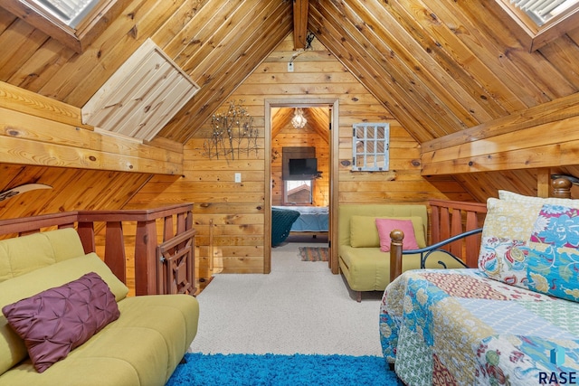 bedroom featuring vaulted ceiling with skylight, carpet flooring, and wood walls