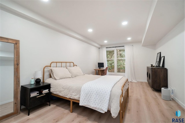 bedroom featuring light wood-type flooring