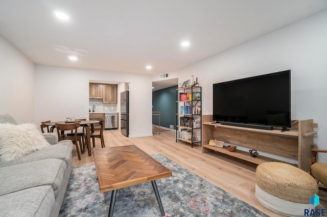 living room with light wood-type flooring