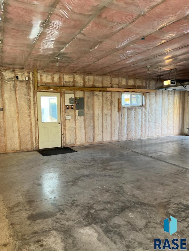 323 W Lincoln St, Luverne, MN 56156 - garage featuring a garage door opener