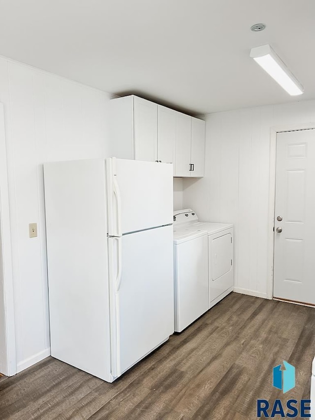 323 W Lincoln St, Luverne, MN 56156 - washroom featuring separate washer and dryer and wood finished floors