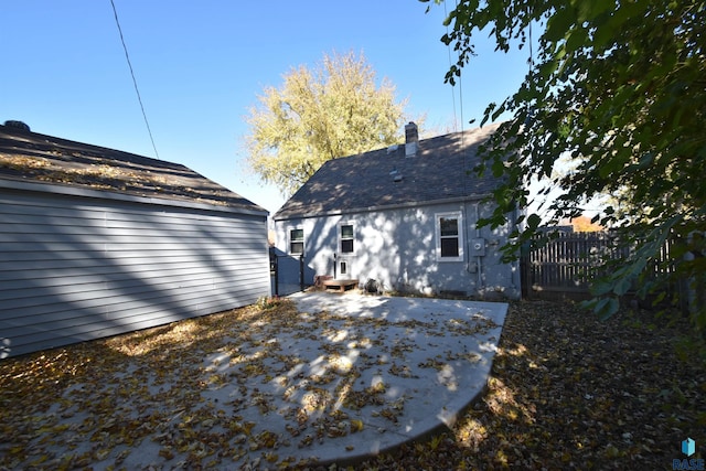 rear view of house featuring a patio