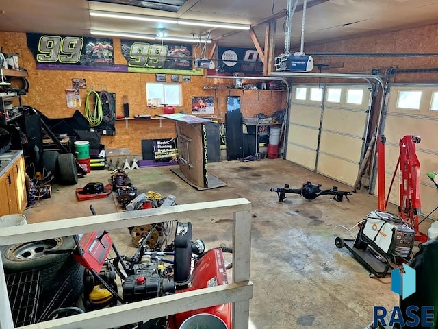 garage featuring a garage door opener