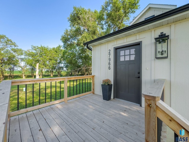 deck featuring a lawn