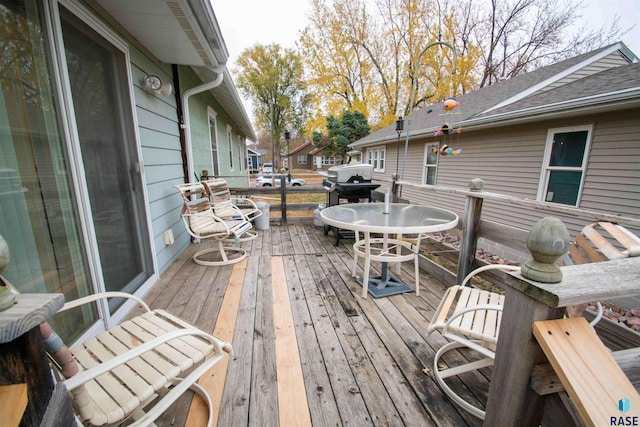 wooden terrace with grilling area