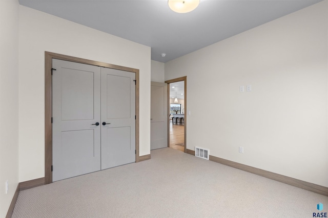 7309 E Shadow Pine Cir, Sioux Falls, SD 57110 - unfurnished bedroom featuring carpet floors, baseboards, and a closet
