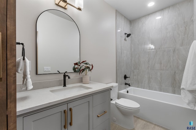 7309 E Shadow Pine Cir, Sioux Falls, SD 57110 - bathroom with vanity, shower / washtub combination, and toilet