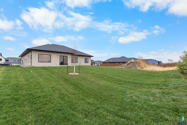 7309 E Shadow Pine Cir, Sioux Falls, SD 57110 - back of house with a lawn