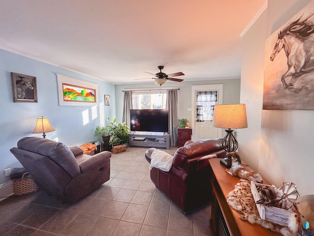 tiled living room featuring ceiling fan and crown molding