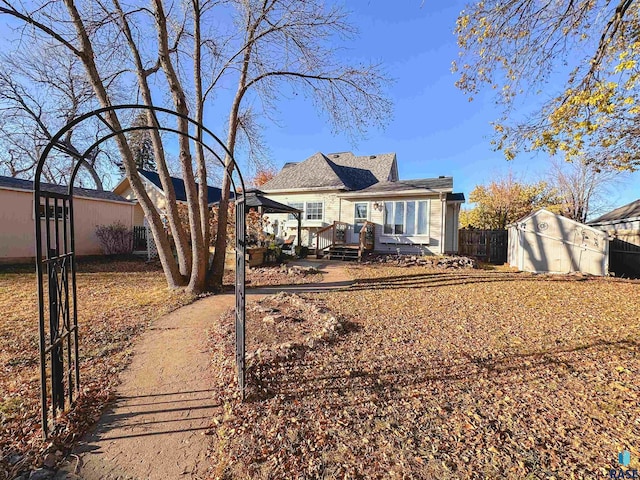 rear view of property with a deck