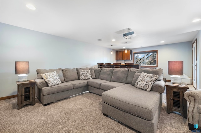 living room featuring light carpet