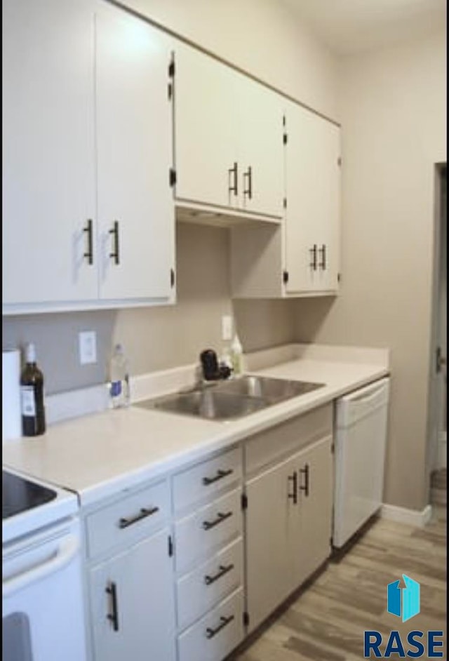 kitchen featuring white cabinetry, sink, light wood-type flooring, and dishwasher