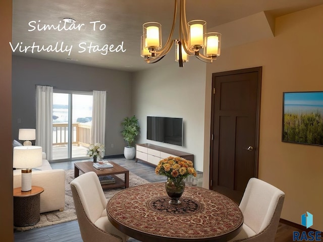 living room featuring hardwood / wood-style flooring and a notable chandelier