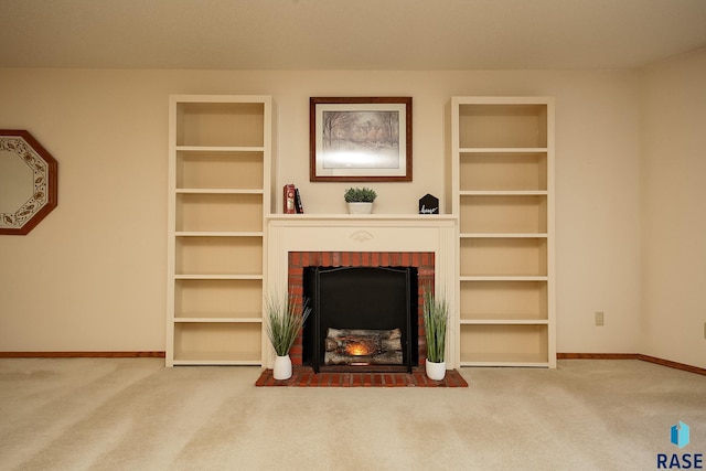 unfurnished living room with a fireplace, built in features, and carpet floors