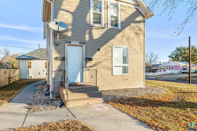 front of property with central AC unit